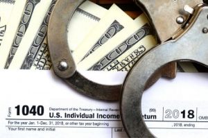 Waitsburg Tax Fraud Defense Attorney criminal tax segment block 300x199